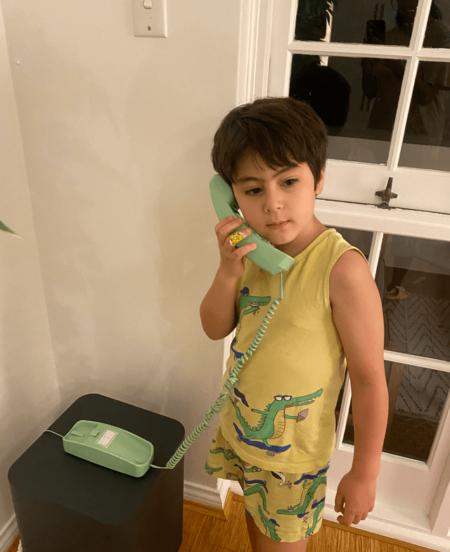 Jules talking on a Yarnie phone